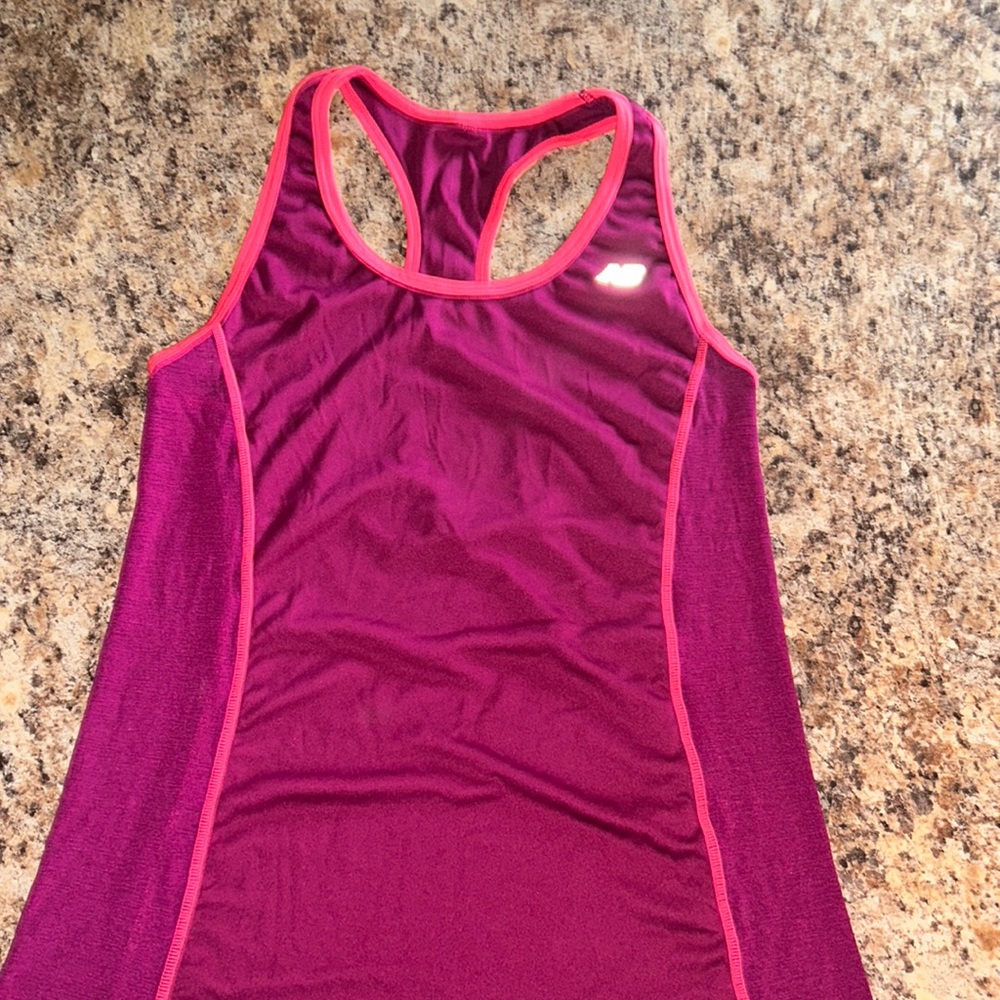 New balance super lightweight running tank. Medium- tags have Been removed